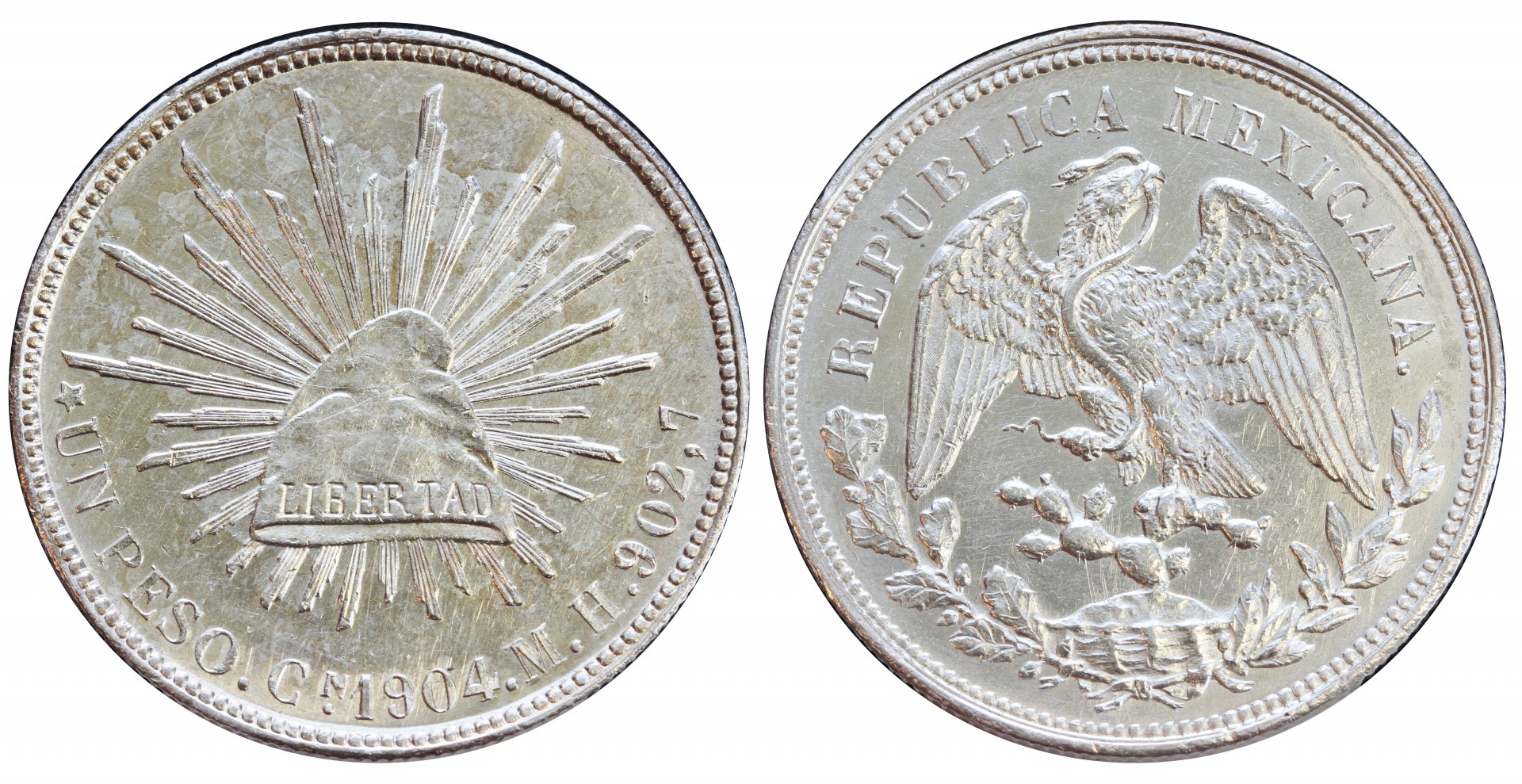 KM# 409 - $1 Peso 1904 Cn MH. 